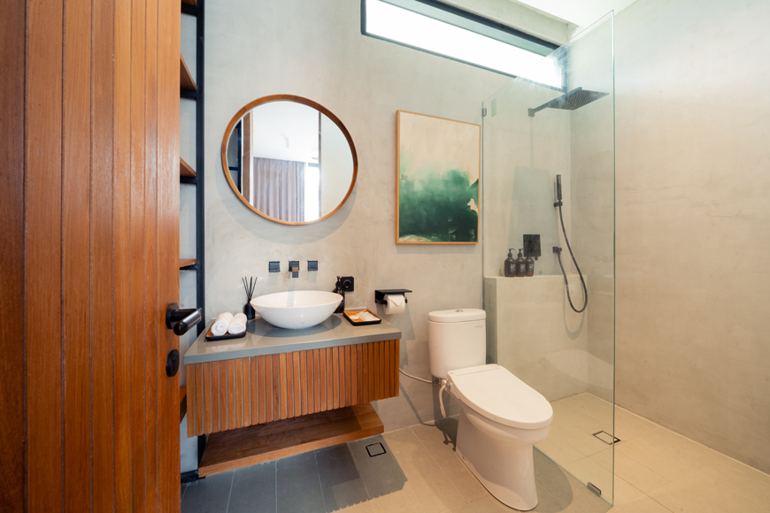 Sawo Villa Canggu — luxury bathroom with bathtub, Bali villa amenities